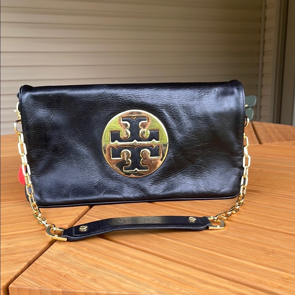 Tory Burch Black and Gold Clutch with shoulder strap